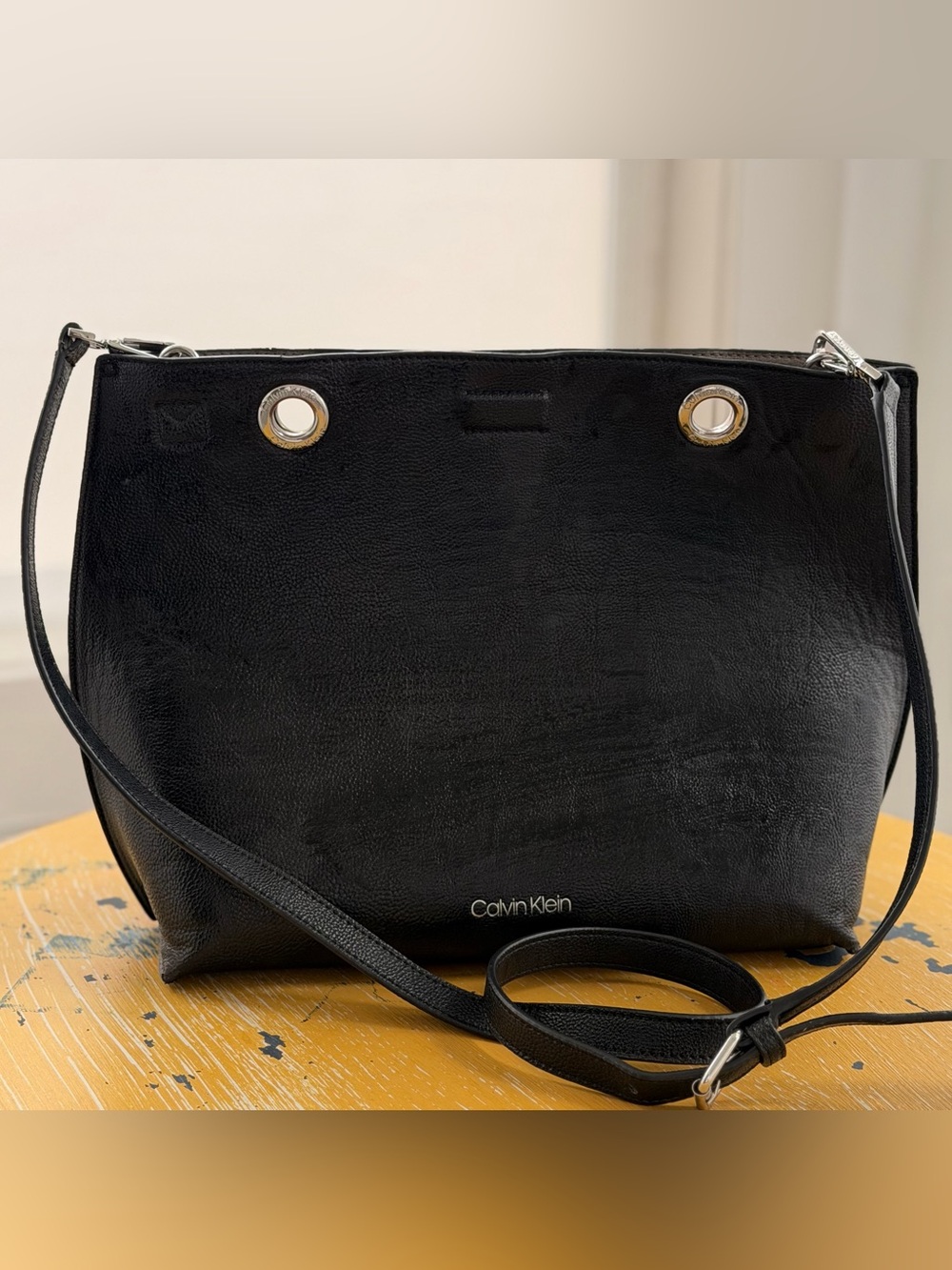 Calvin Klein Black Leather Shoulder Bag with Silver Grommet Detail